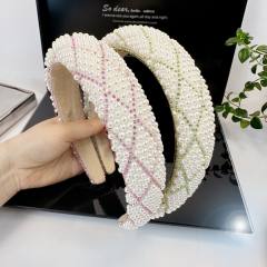 Elegant channel style pearl beaded padded headband