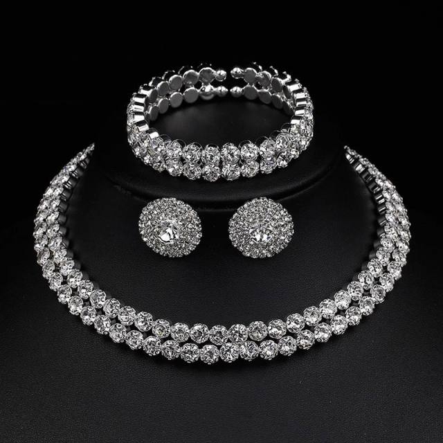 Delicate diamond choker jewelry set with evening bag