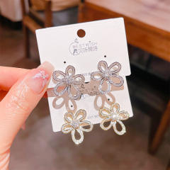 Delicate diamond flower hollow out studs earrings