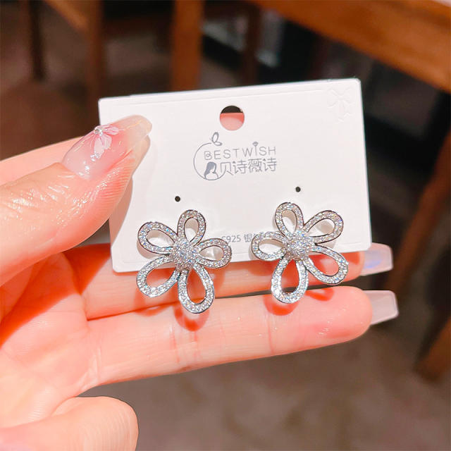 Delicate diamond flower hollow out studs earrings