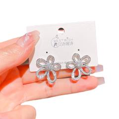 Delicate diamond flower hollow out studs earrings