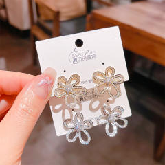 Delicate diamond flower hollow out studs earrings