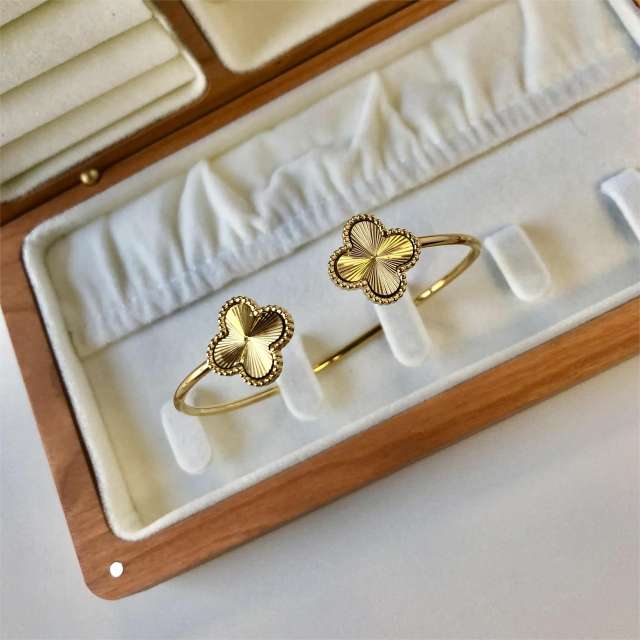 Hot sale gold color clover hollow out stainless steel cuff bangle
