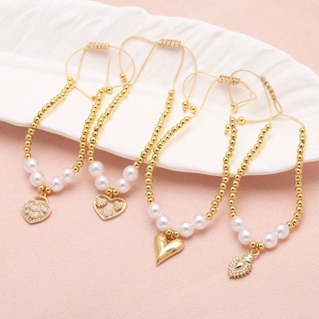 Elegant pearl bead gold plated copper heart charm slide bracelet