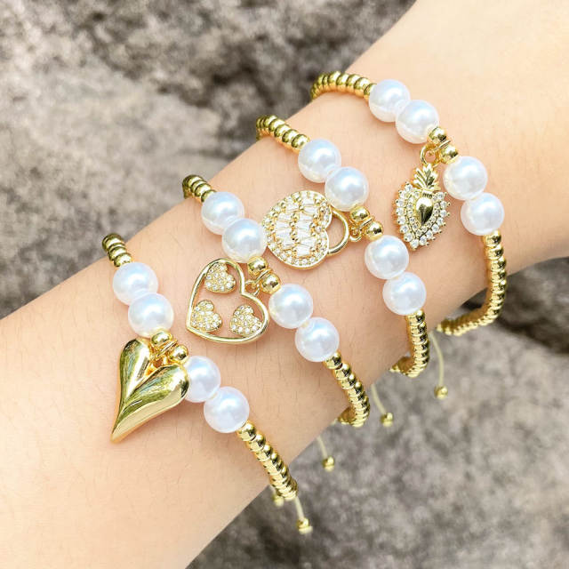 Elegant pearl bead gold plated copper heart charm slide bracelet