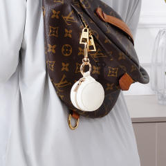 Portatable round shape PU leather mini travel jewelry box keychain