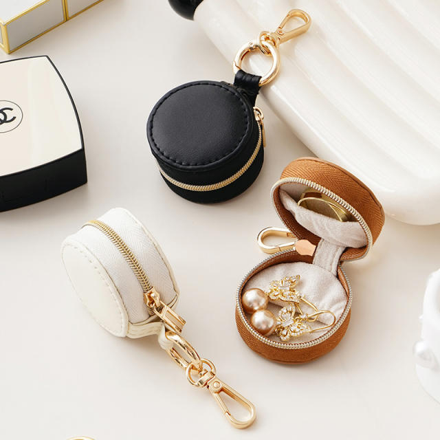 Portatable round shape PU leather mini travel jewelry box keychain