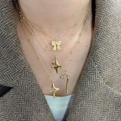 Dainty bow cross pendant stainless steel necklace