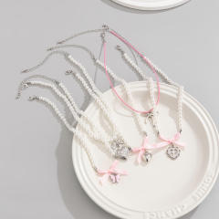 Silver heart bow charm imitation pearl bead layer necklace set