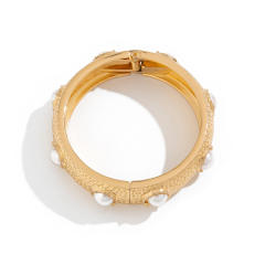 Chunky metal imitation pearl twist spring buckle bangle bracelet