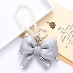 Sweet imitation pearl chain big bow keychain bag charm pendant