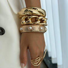 Chunky metal imitation pearl twist spring buckle bangle bracelet