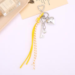 Silver metal heart key charm pu leather tassel keychain bag charm pendant