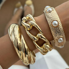 Chunky metal imitation pearl twist spring buckle bangle bracelet