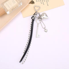 Silver metal heart key charm pu leather tassel keychain bag charm pendant