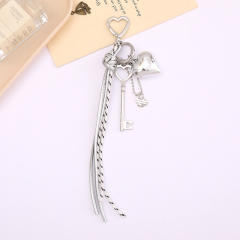 Silver metal heart key charm pu leather tassel keychain bag charm pendant