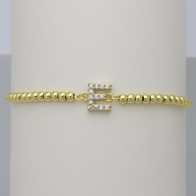 Delicate diamond initial letter gold plated copper bead bracelet