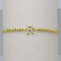 Delicate diamond initial letter gold plated copper bead bracelet
