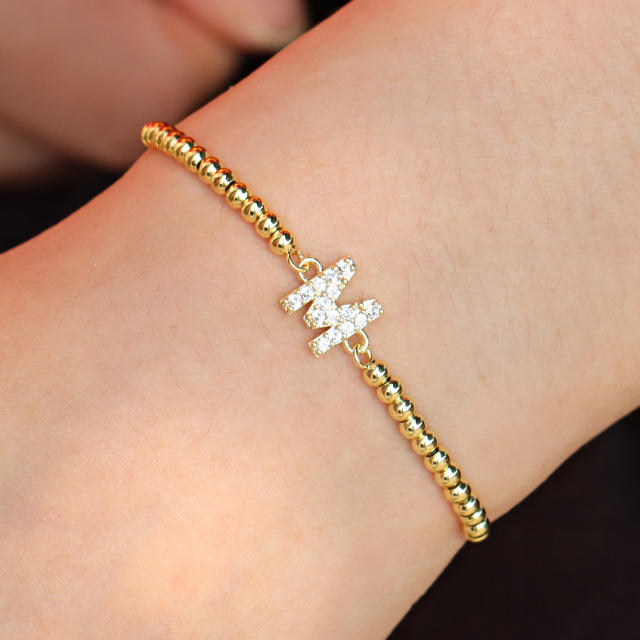 Delicate diamond initial letter gold plated copper bead bracelet