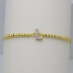 Delicate diamond initial letter gold plated copper bead bracelet