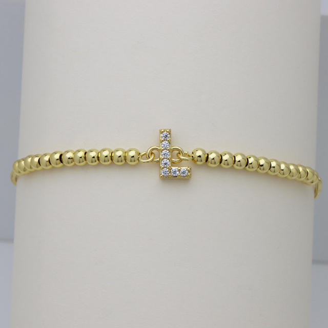 Delicate diamond initial letter gold plated copper bead bracelet
