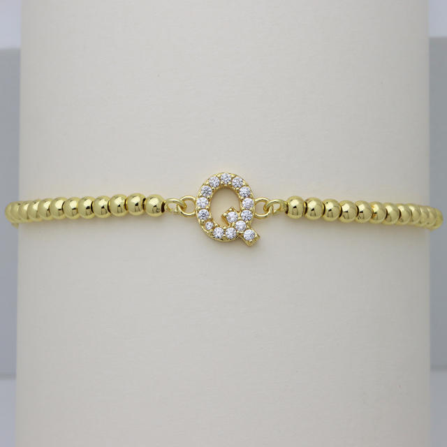 Delicate diamond initial letter gold plated copper bead bracelet
