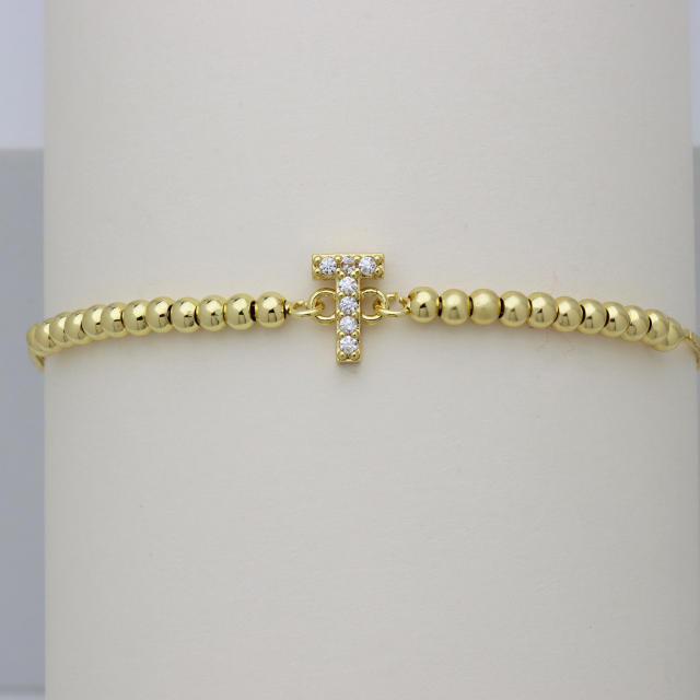 Delicate diamond initial letter gold plated copper bead bracelet
