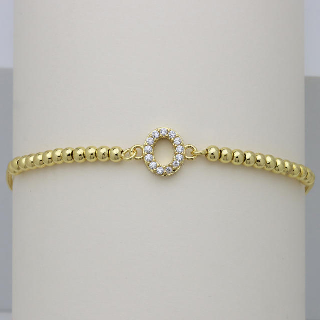 Delicate diamond initial letter gold plated copper bead bracelet