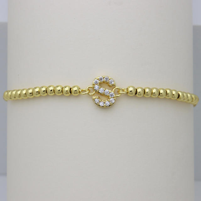 Delicate diamond initial letter gold plated copper bead bracelet