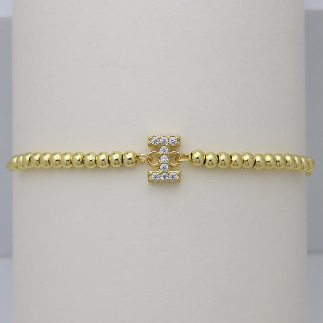 Delicate diamond initial letter gold plated copper bead bracelet