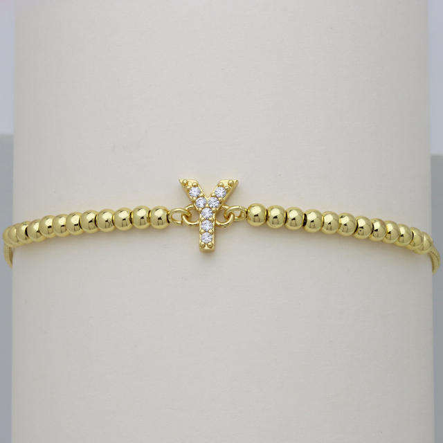 Delicate diamond initial letter gold plated copper bead bracelet