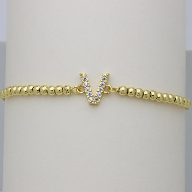 Delicate diamond initial letter gold plated copper bead bracelet