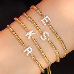 Delicate diamond initial letter gold plated copper bead bracelet