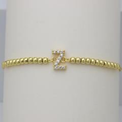 Delicate diamond initial letter gold plated copper bead bracelet