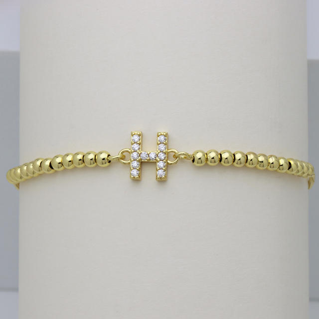 Delicate diamond initial letter gold plated copper bead bracelet