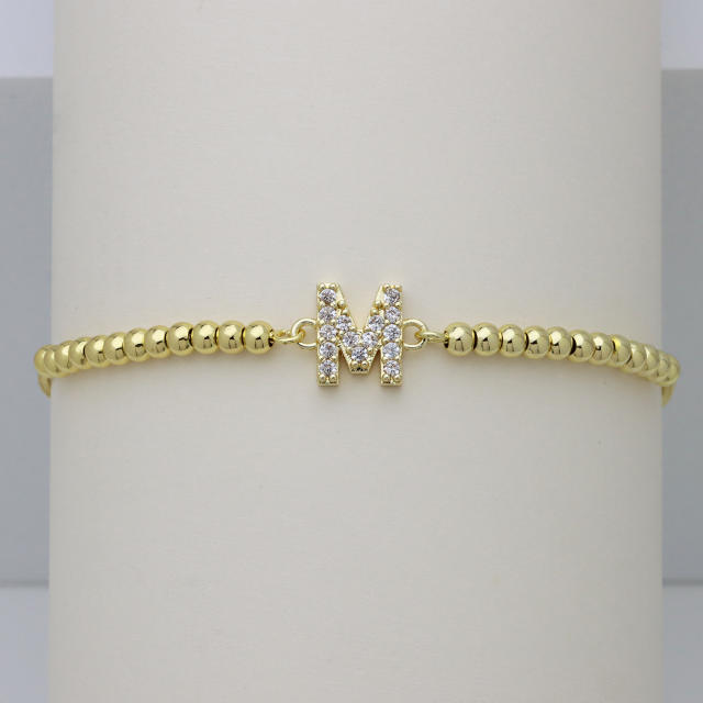 Delicate diamond initial letter gold plated copper bead bracelet
