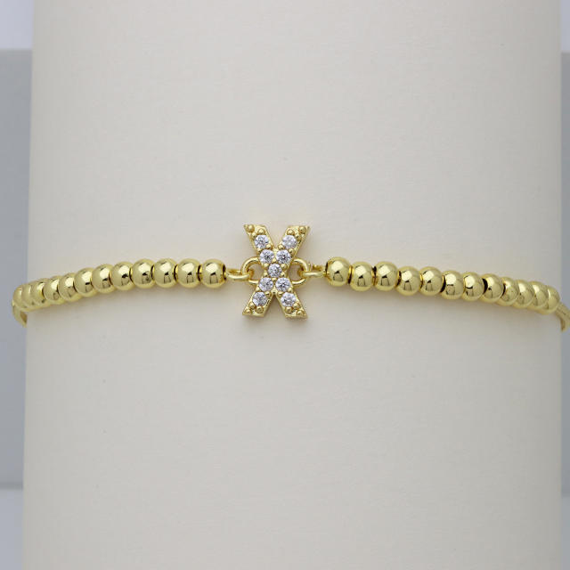Delicate diamond initial letter gold plated copper bead bracelet