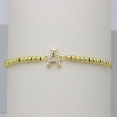 Delicate diamond initial letter gold plated copper bead bracelet