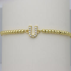 Delicate diamond initial letter gold plated copper bead bracelet