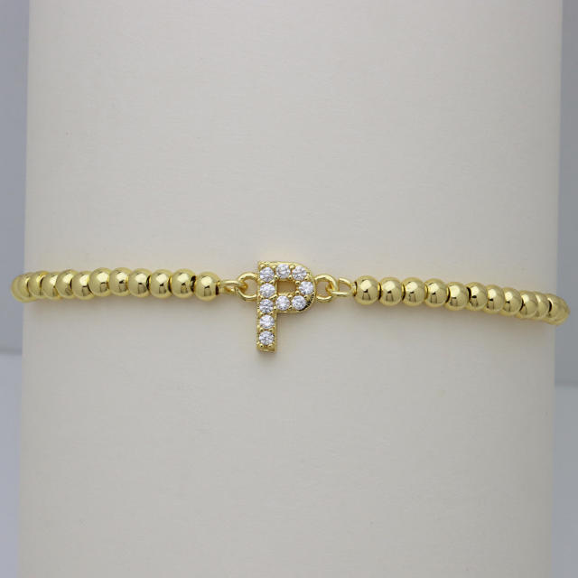 Delicate diamond initial letter gold plated copper bead bracelet