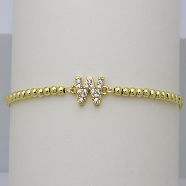 Delicate diamond initial letter gold plated copper bead bracelet