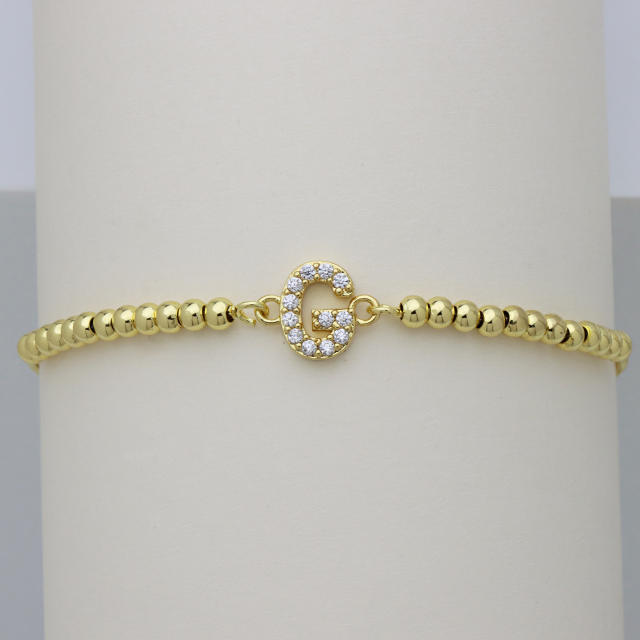 Delicate diamond initial letter gold plated copper bead bracelet