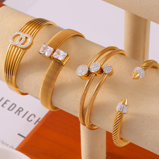 Luxury Elegant diamond statement Geometric Texture Titanium Steel Plated 18K Gold bangle collection