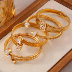 Luxury Elegant diamond statement Geometric Texture Titanium Steel Plated 18K Gold bangle collection