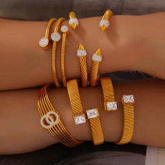 Luxury Elegant diamond statement Geometric Texture Titanium Steel Plated 18K Gold bangle collection