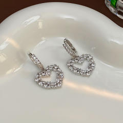 Delicate diamond heart gold plated copper huggie earrings