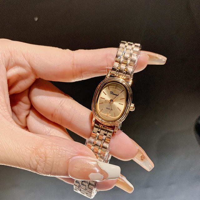 Luxury stainless steel band oval shape small dial watch for women