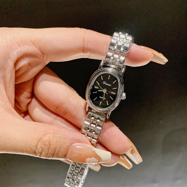 Luxury stainless steel band oval shape small dial watch for women