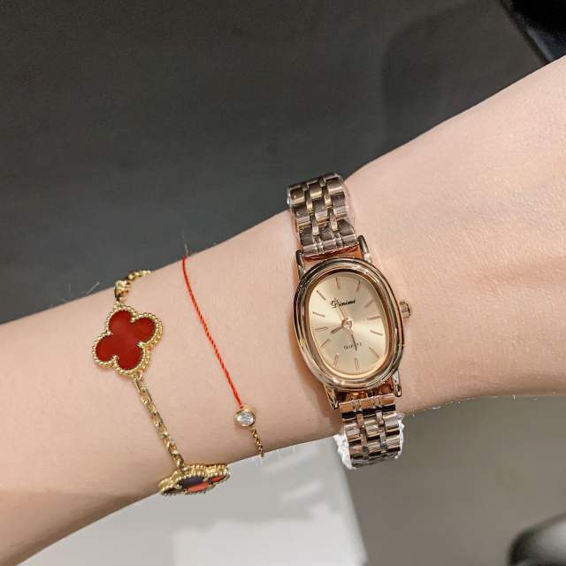Luxury stainless steel band oval shape small dial watch for women