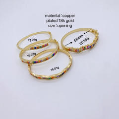 Irregular shape rainbow cubic zircon gold plated copper bangle